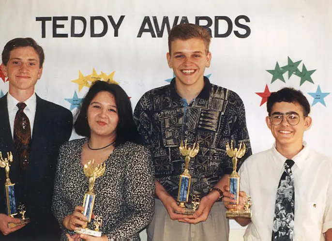 Award winners posing with their trophies