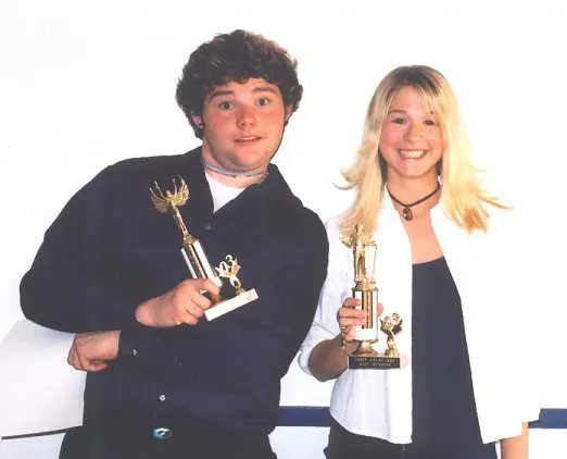 Award recipients posing with trophies