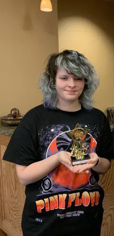 Young person in a themed t-shirt