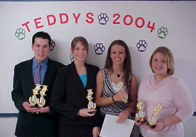 Group holding trophies at Teddys 2004 event