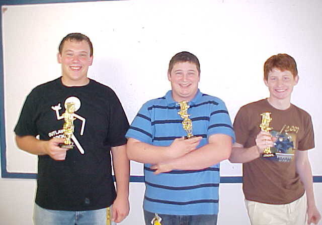 Group of young men with awards